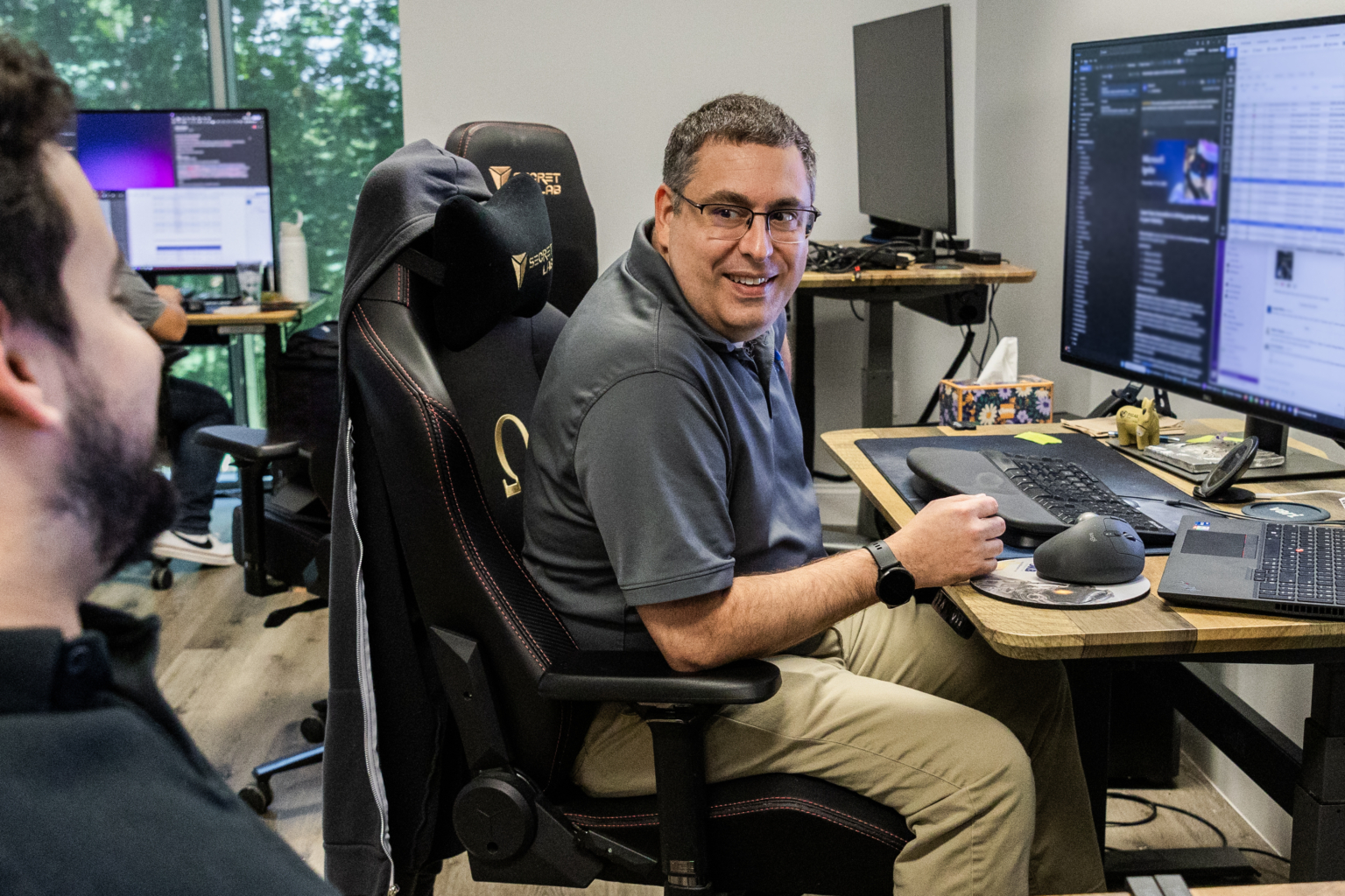 IT consultant reviewing cybersecurity framework requirements for Texas SB 2610 safe harbor compliance